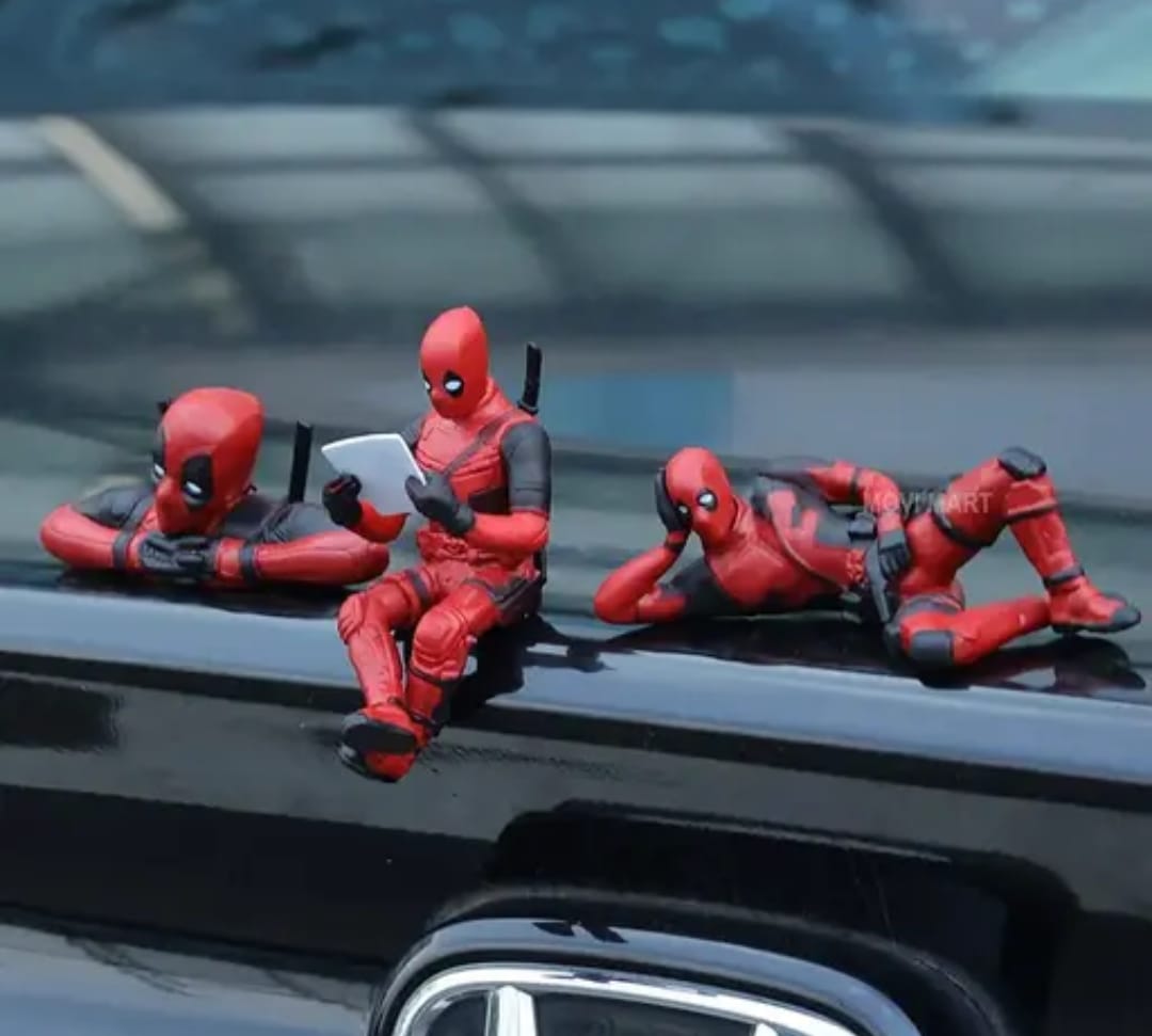Car dashboard spiderman toy